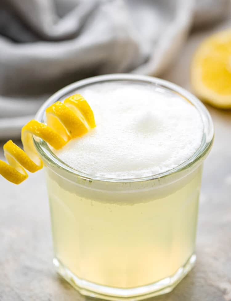 Classic Gin Fizz in cocktail glass with foamy top