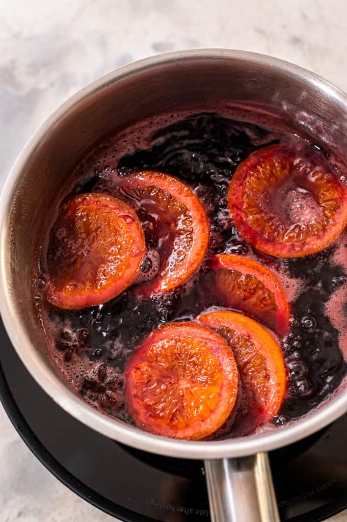 Saucepan with boiling mulled wine