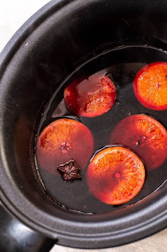 Cooked Mulled wine in black crockpot