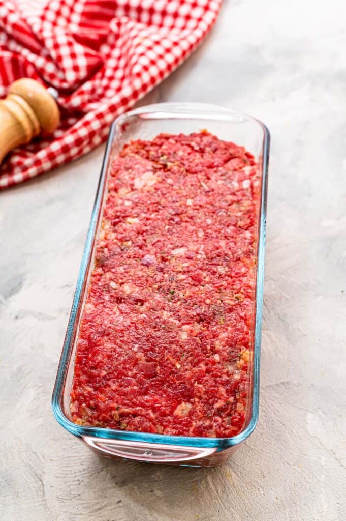 Ground beef mixture in glass loaf pan