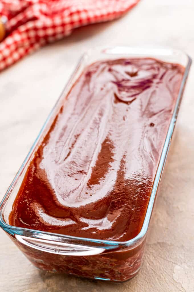 Glass pan with meatloaf and ketchup glaze