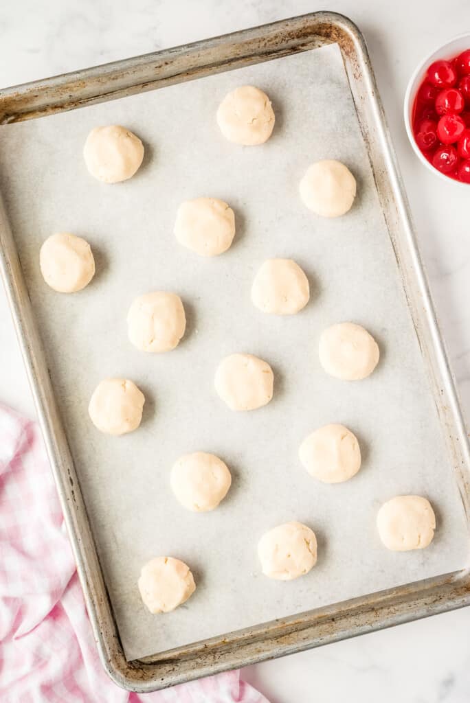 Overhead image of sheet pan with Almond Sugar Cookies