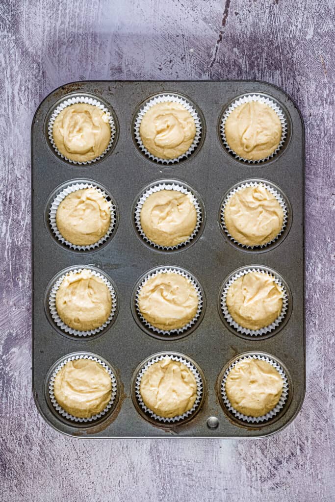 Pan of unbaked vanilla cupcakes