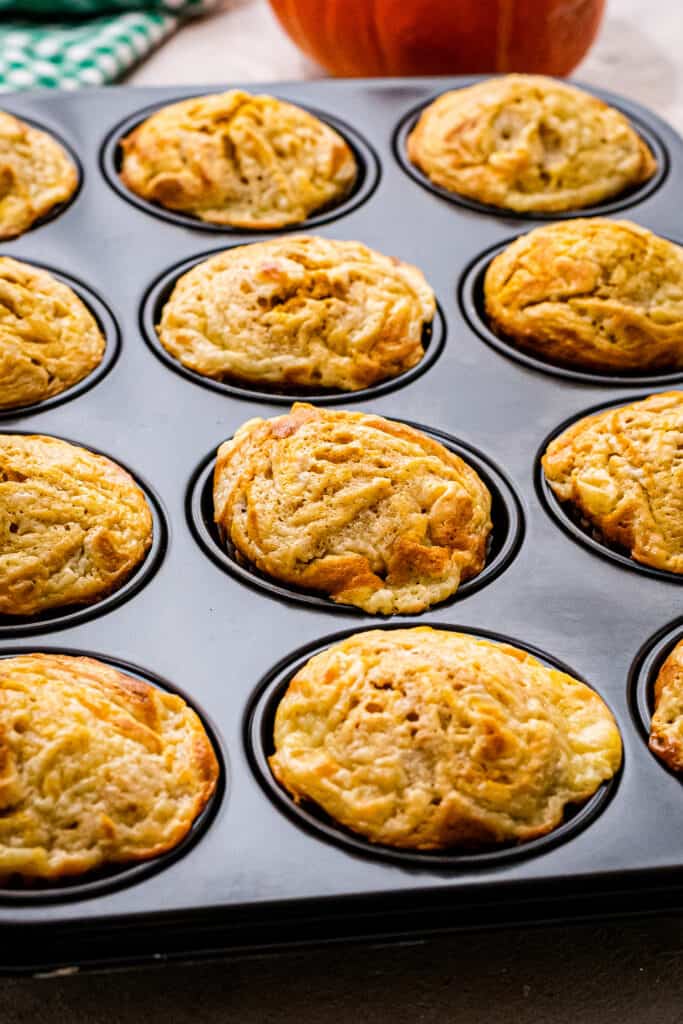 Pumpkin Cream Cheese Muffins baked in a muffin tin