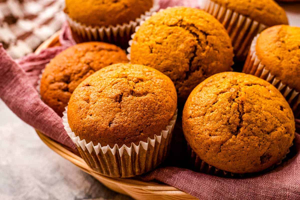 Basket full of homemade pumpkin muffins