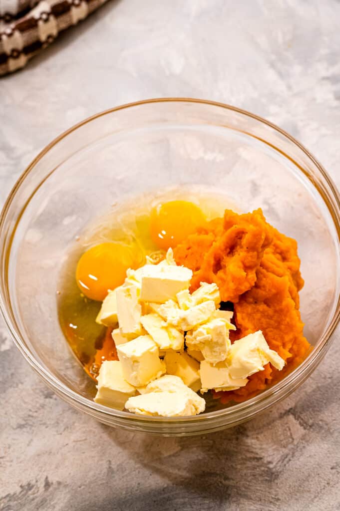 Wet ingredients for muffins before mixing together in glass bowl