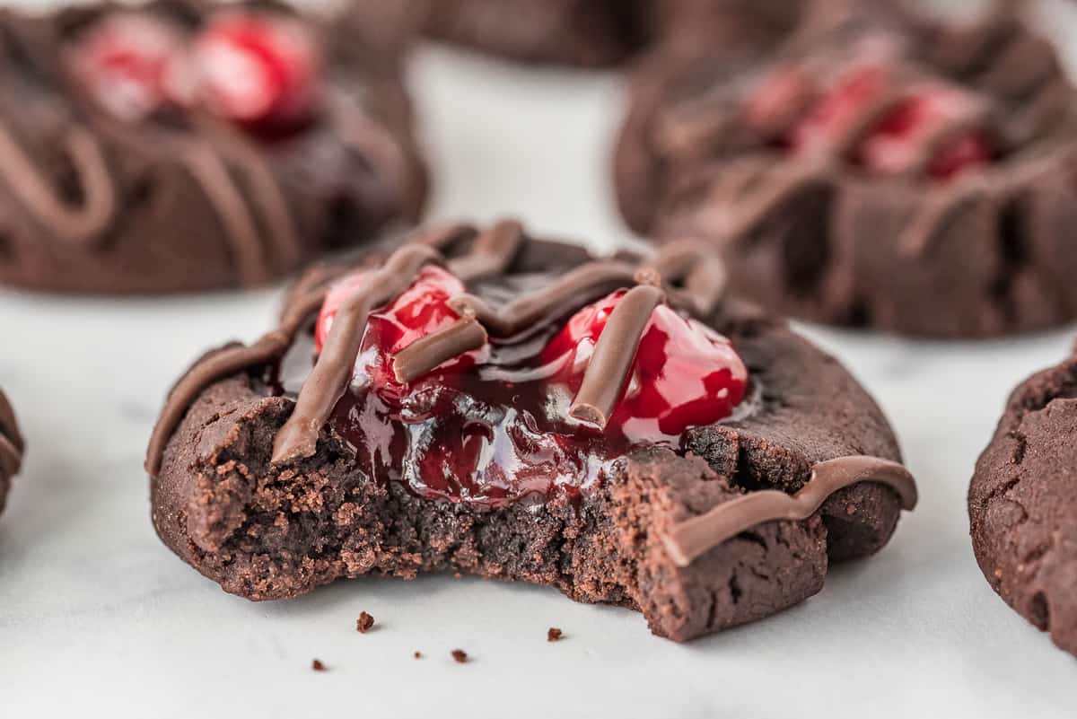 Chocolate Thumbprint cookie with a bite out of it