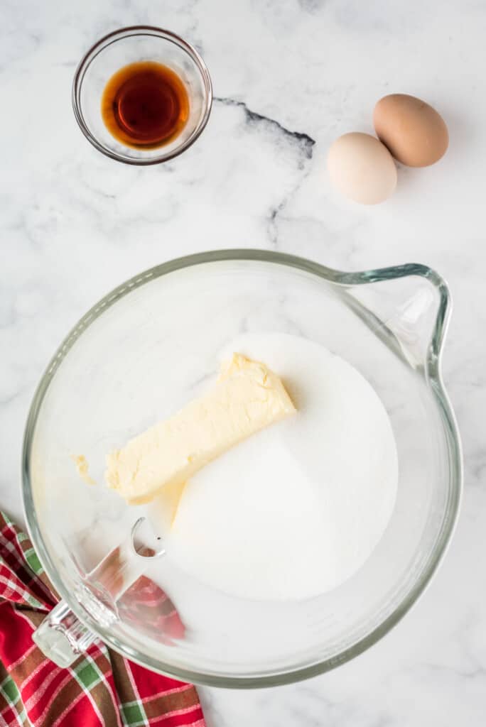 Glass bowl with butter and sugar