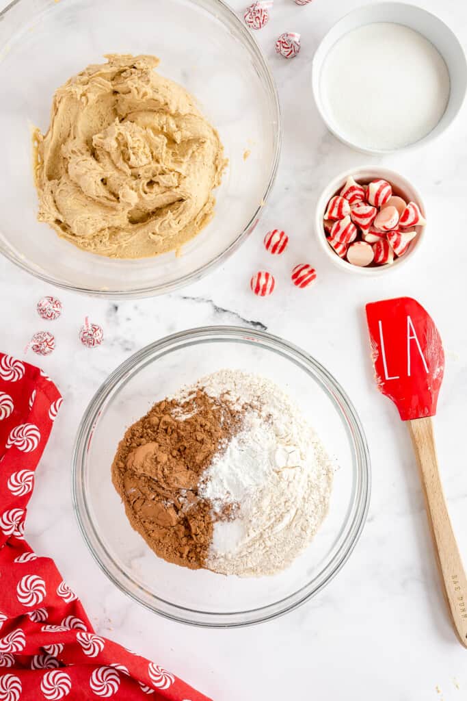 Glass mixing bowl with cocoa powder and flour