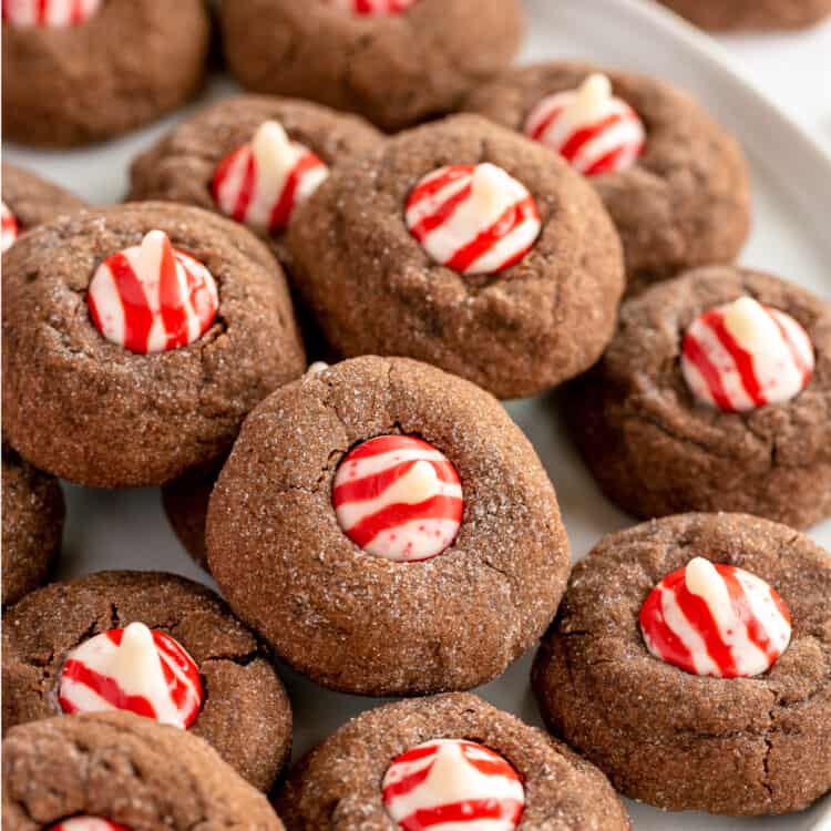 White plate with Chocolate Peppermint Kiss Cookies on it