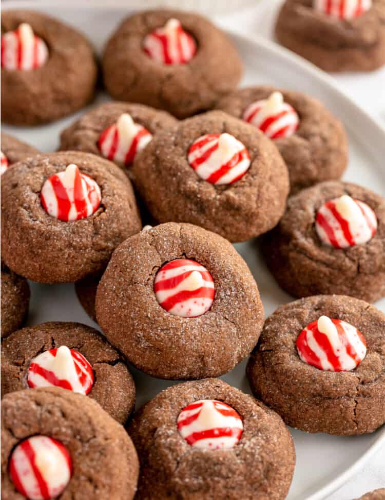 White plate with Chocolate Peppermint Kiss Cookies on it