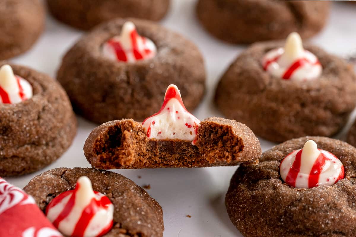 Chocolate Peppermint Kiss Cookies with a bite out of one of them