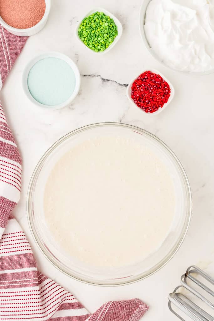 Overhead image of white cake mix in bowl