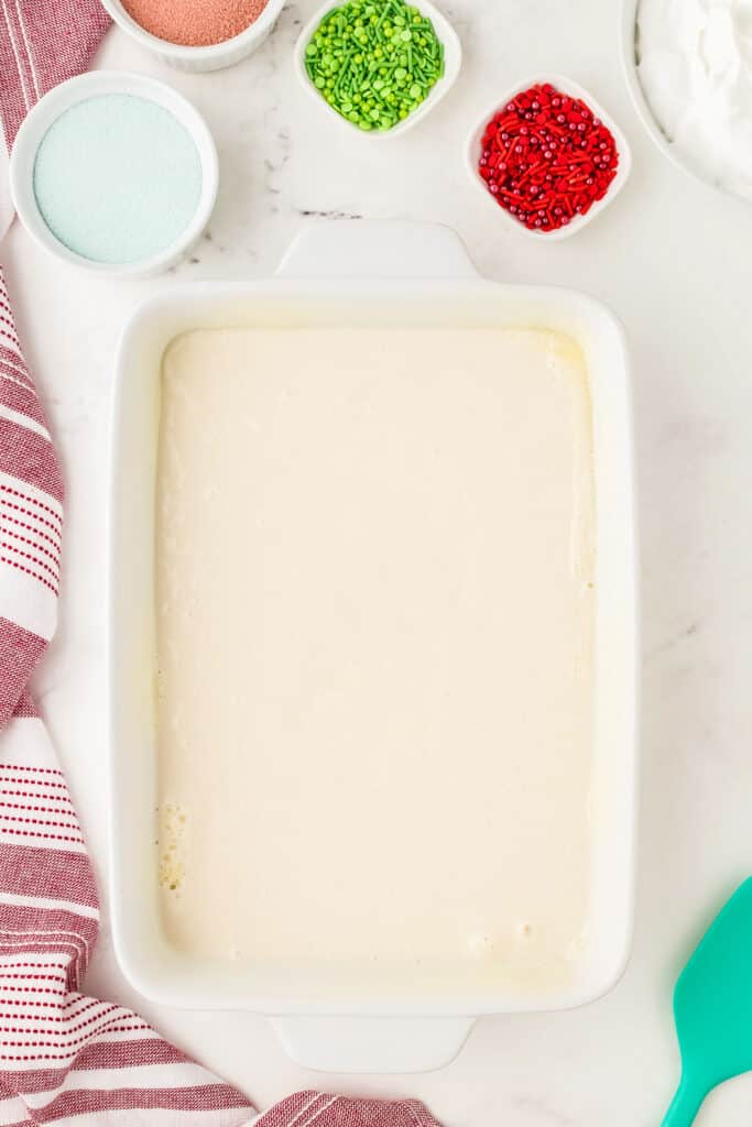 Overhead image of cake mix batter in white baking dish