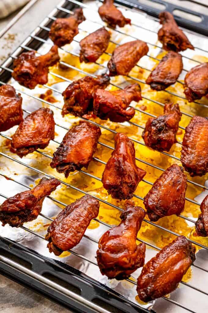 Sheet pan with wire rack and chicken wings broiled on them