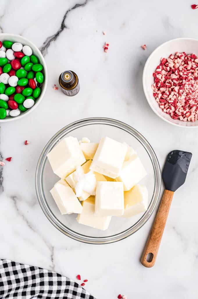 Bowl of white almond bark and coconut oil in bowl