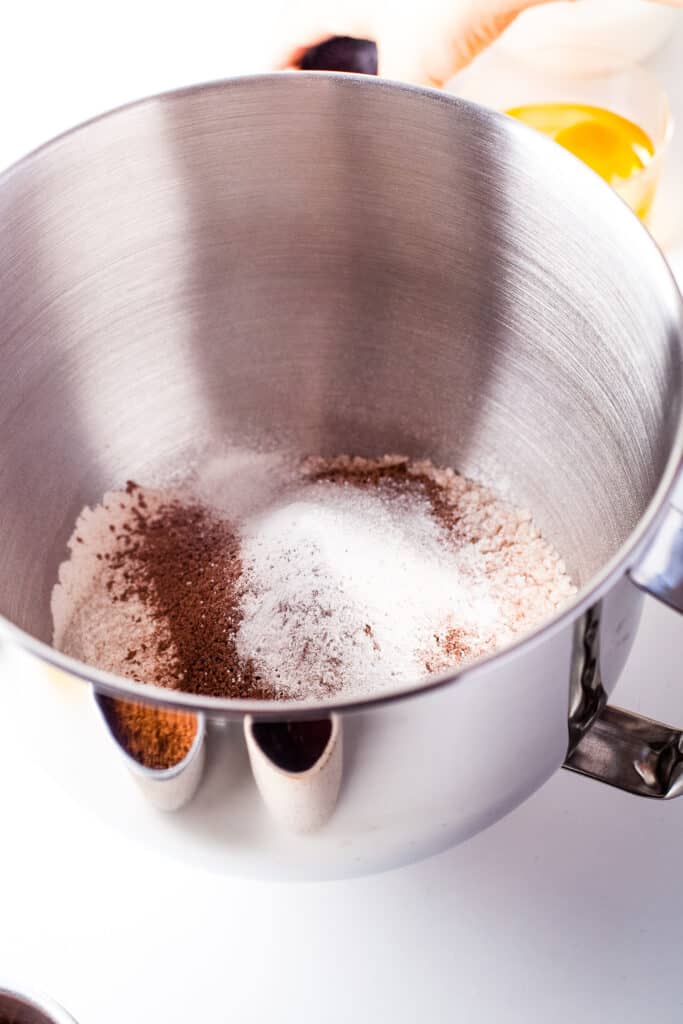 Dry ingredients in mixing bowl for chocolate donuts