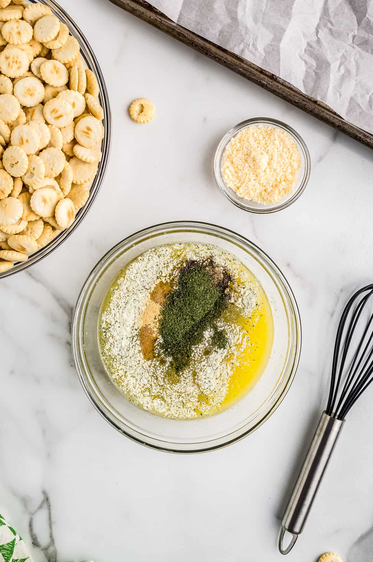 Overhead image of melted butter and seasonings