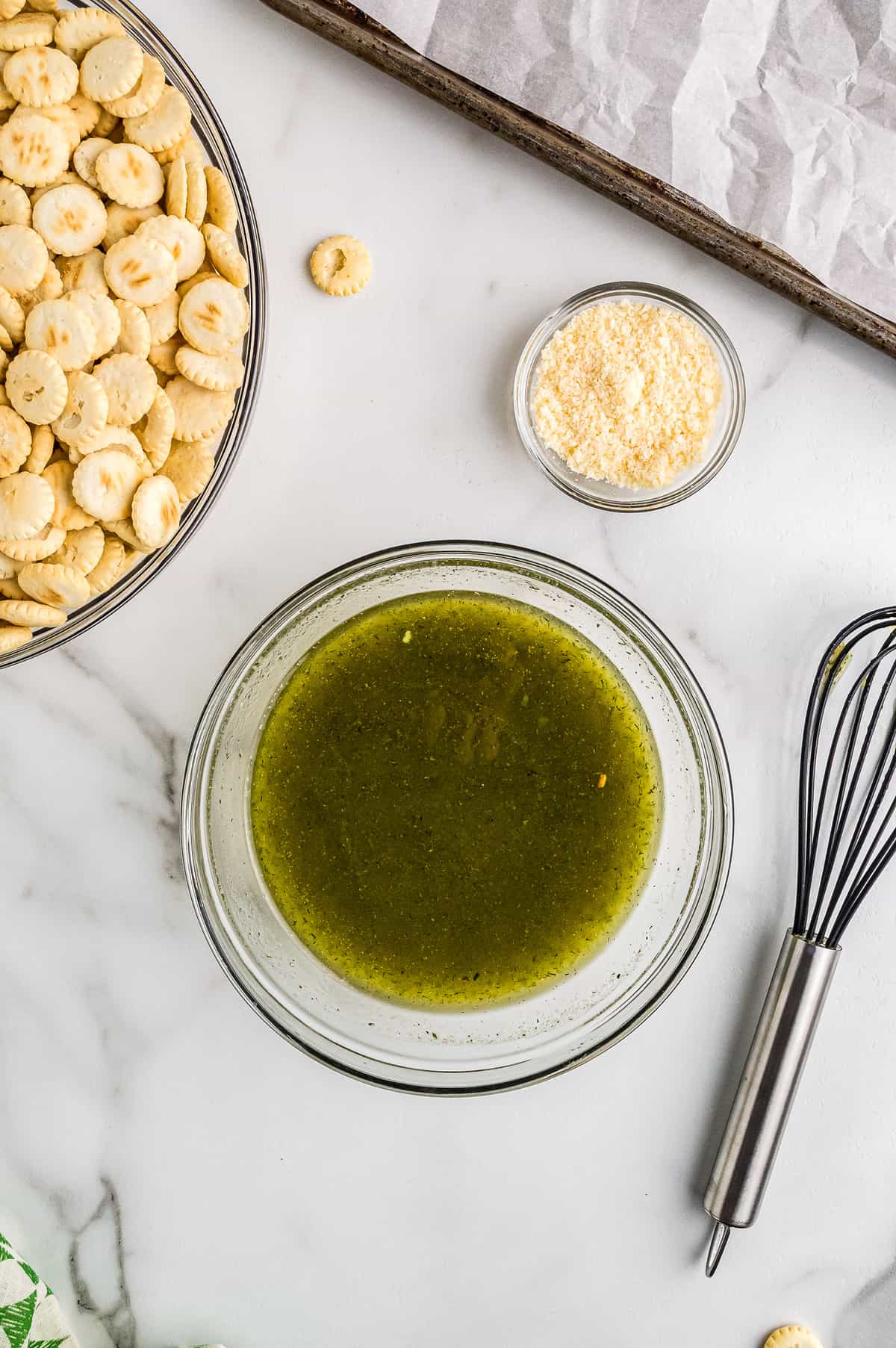 Glass bowl with melted butter and seasonings