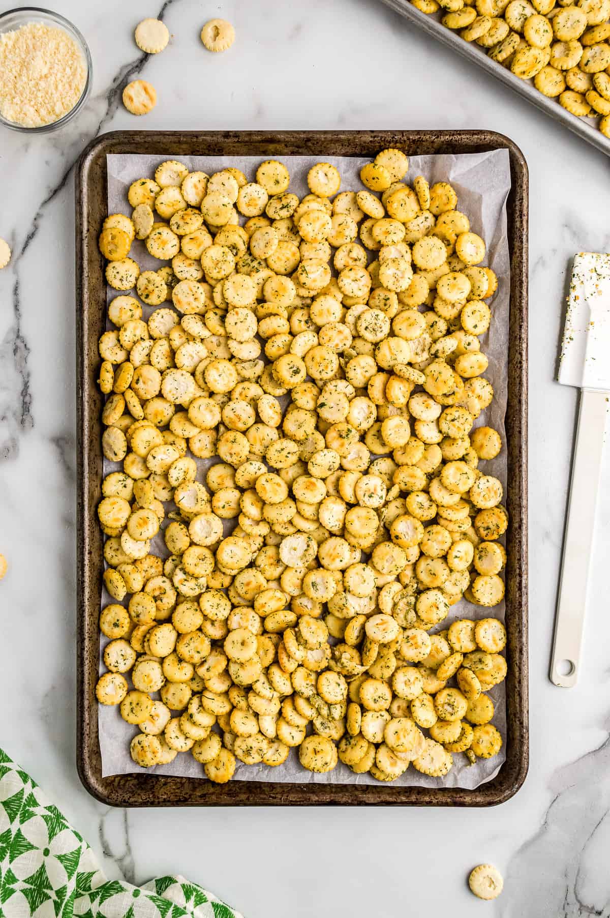 Seasoned oyster crackers on sheet pan