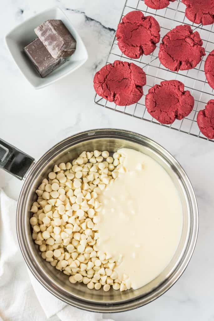 Saucepan with white chocolate chips and sweet condensed milk