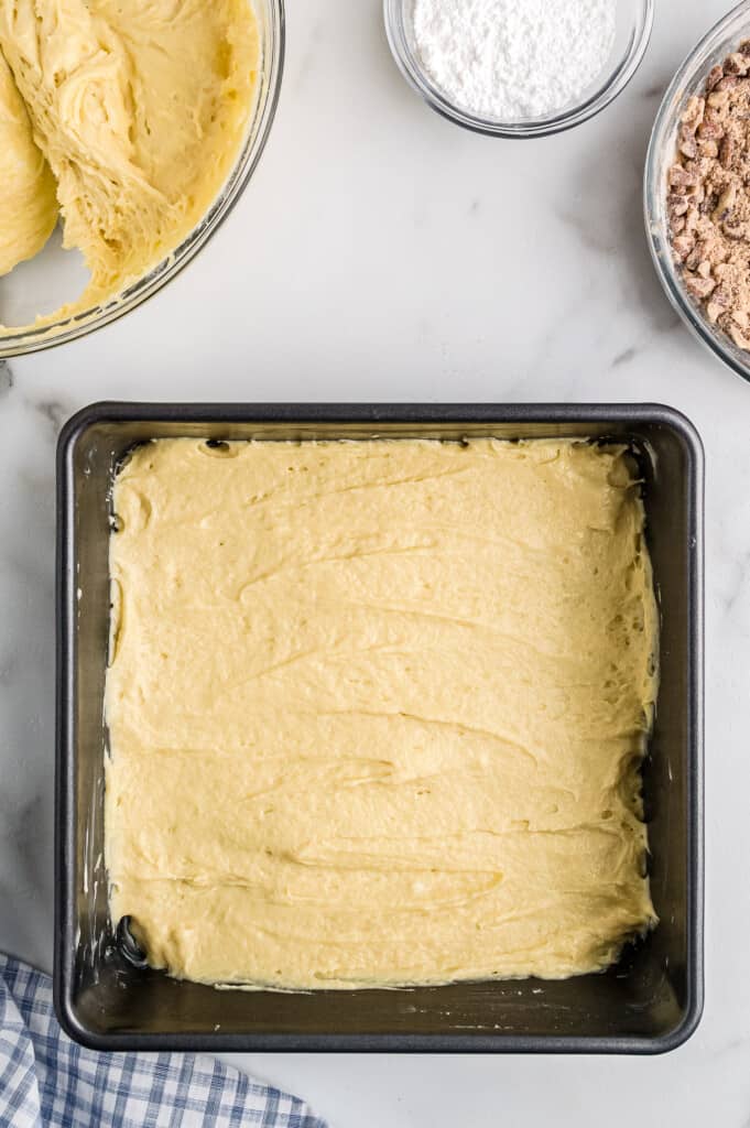 Overhead image of coffee cake batter in pan