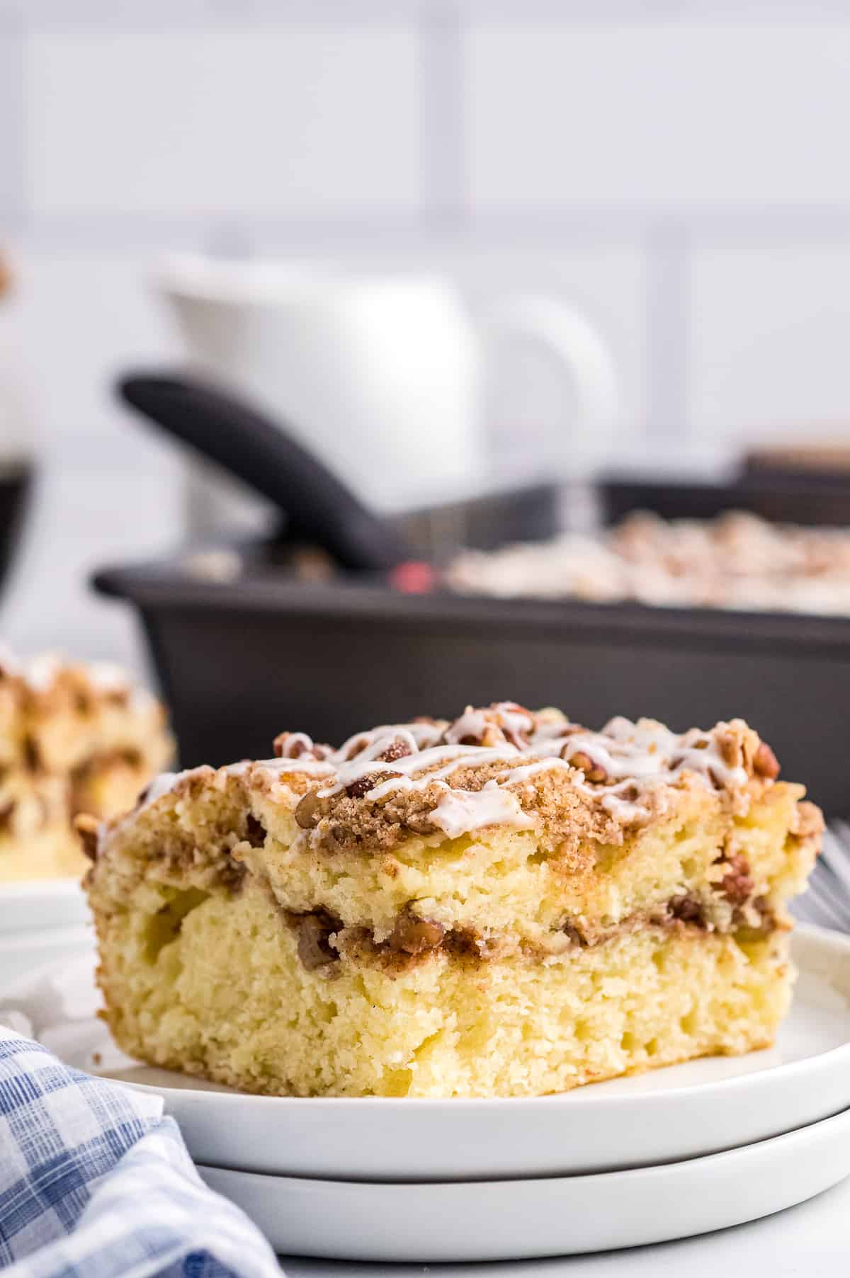 Sour Cream Coffee Cake piece on white plate