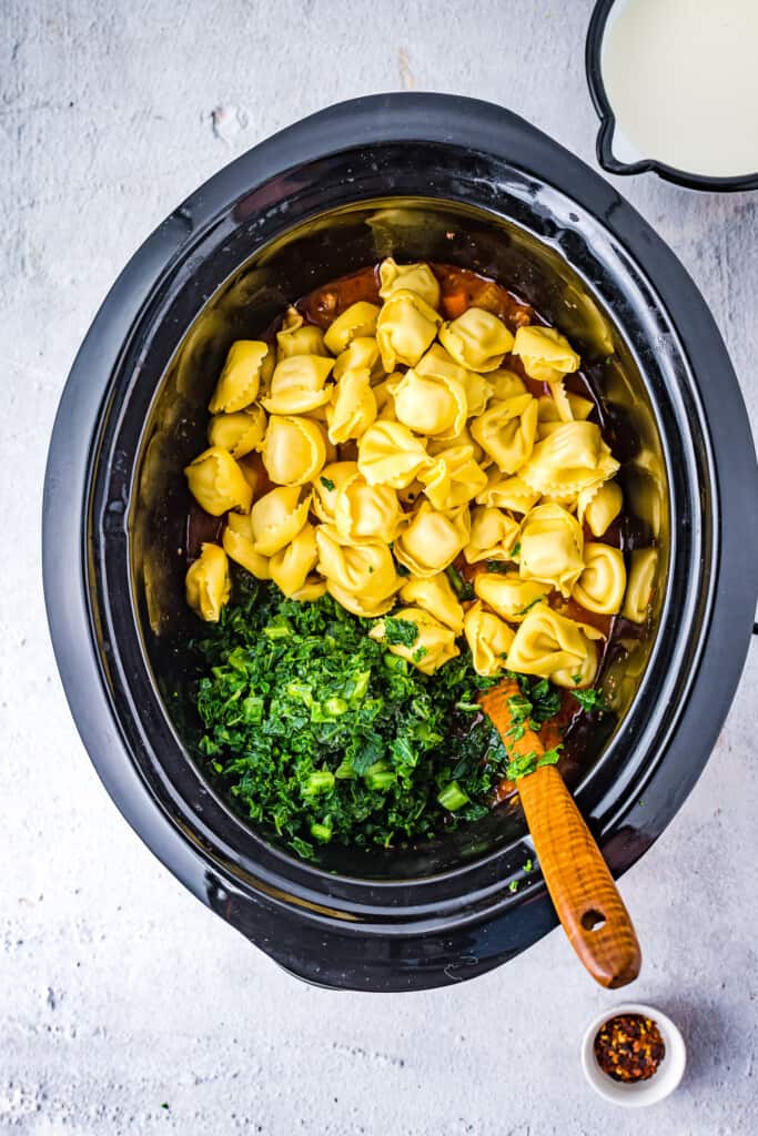 Add kale and tortellini to crock pot