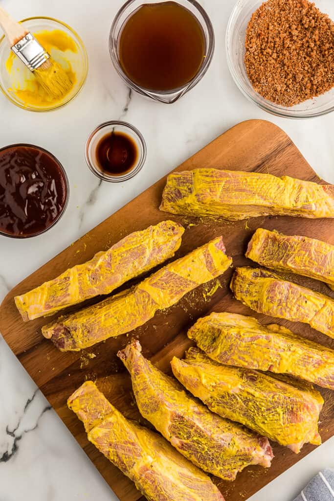 Country style ribs rubbed in yellow mustard