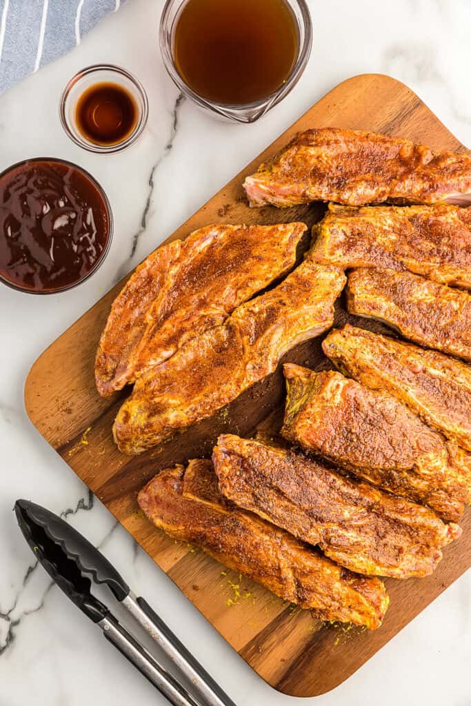 Seasoned country style ribs on cutting board