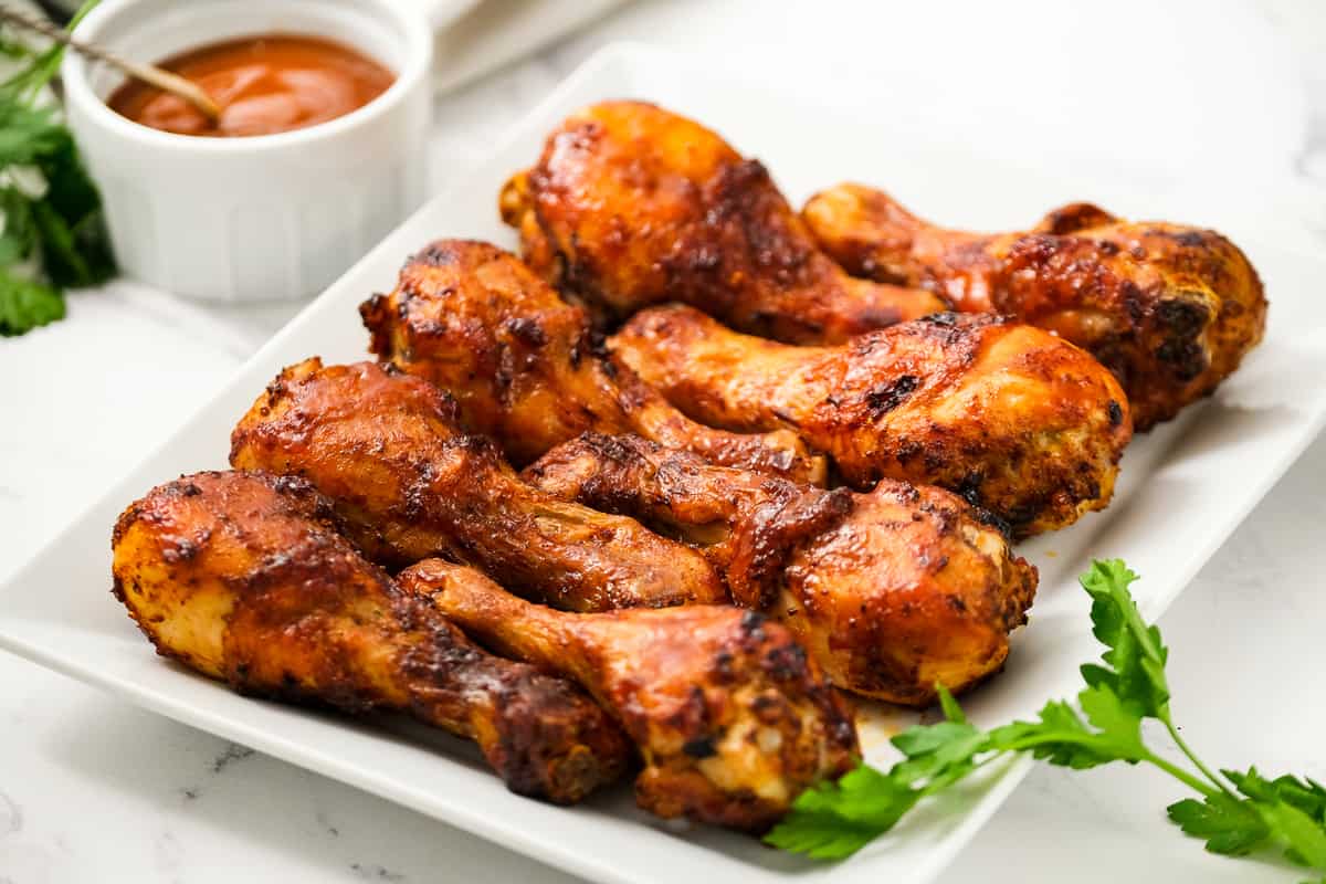 BBQ Air Fryer Chicken Legs on a white plate