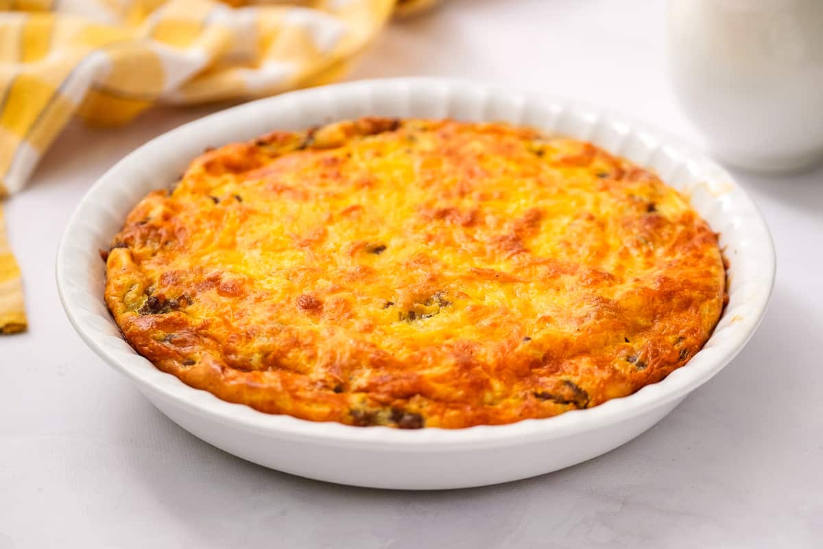 White baking dish with impossibly easy cheeseburger pie