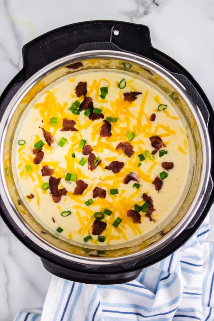 Instant Pot with potato soup in it