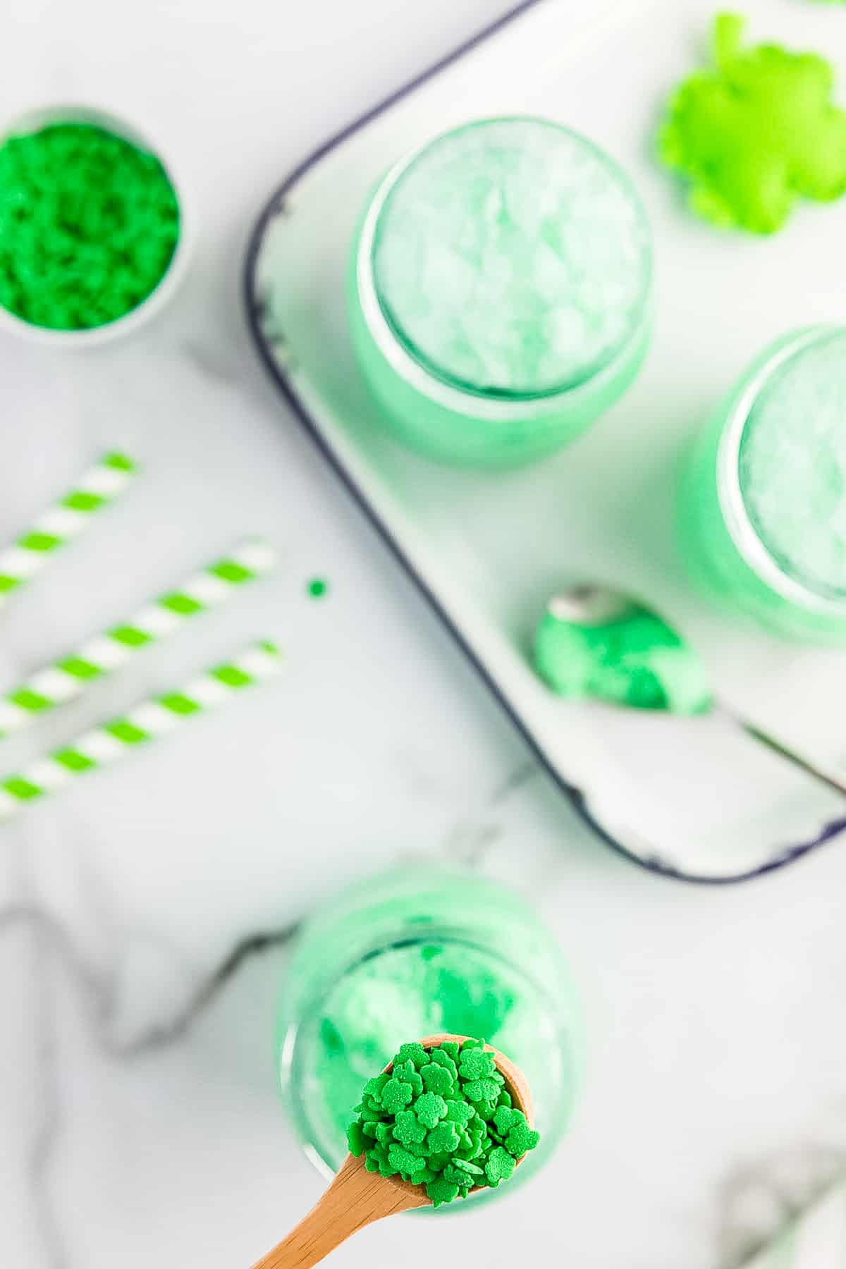 Putting green shamrock sprinkles on lime float