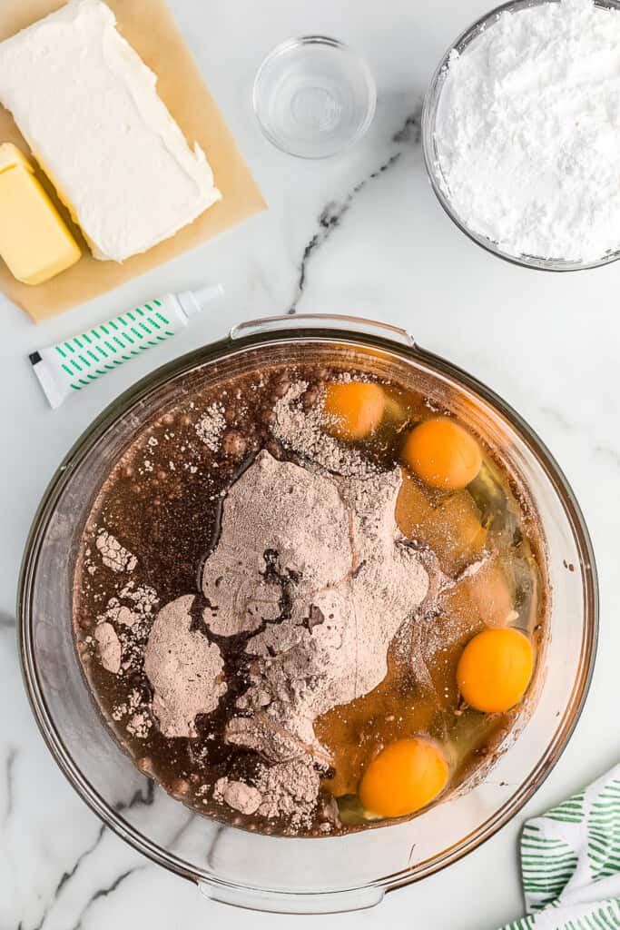 Mixing bowl with ingredients to make chocolate brownie cookies before mixing