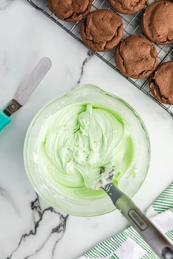 Mixing bowl with mint cream cheese frosting
