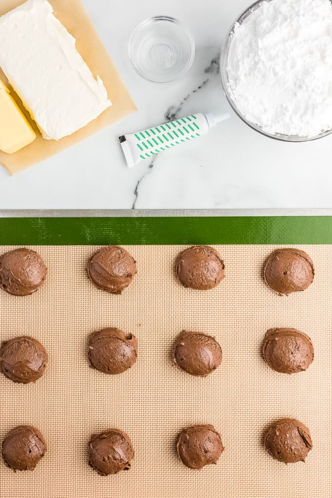 Sheet pan with chocolate cookie dough on it