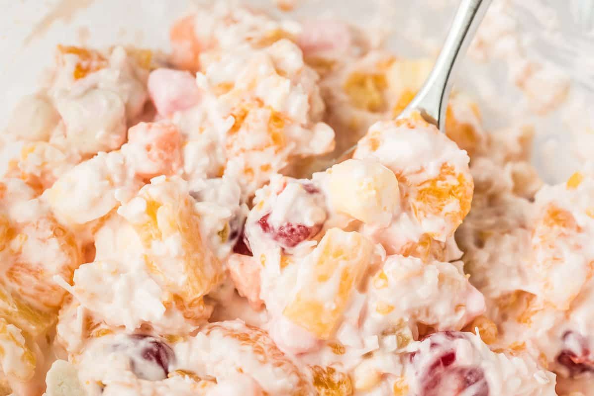 Close up image of Ambrosia Salad with spoon in it