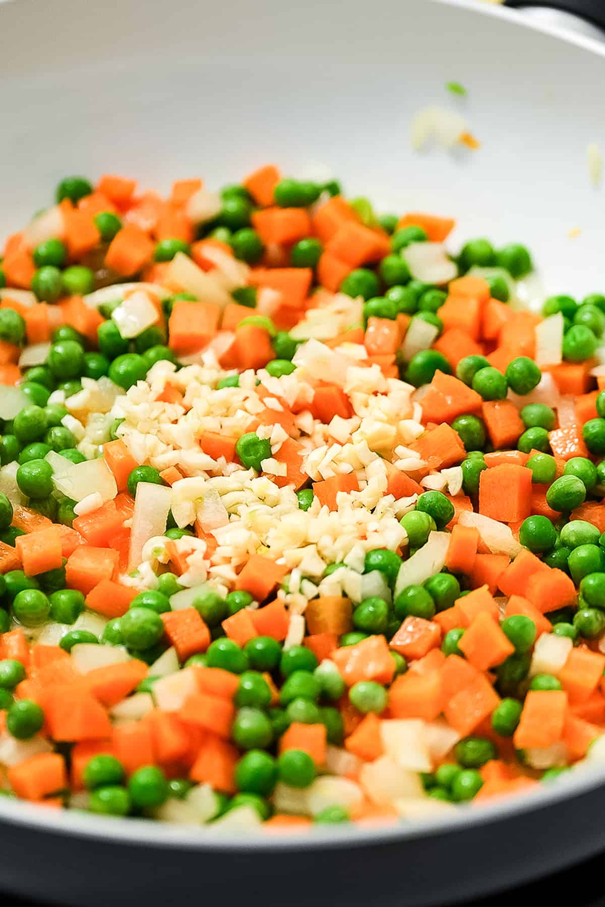 Skillet with vegetables for fried rice