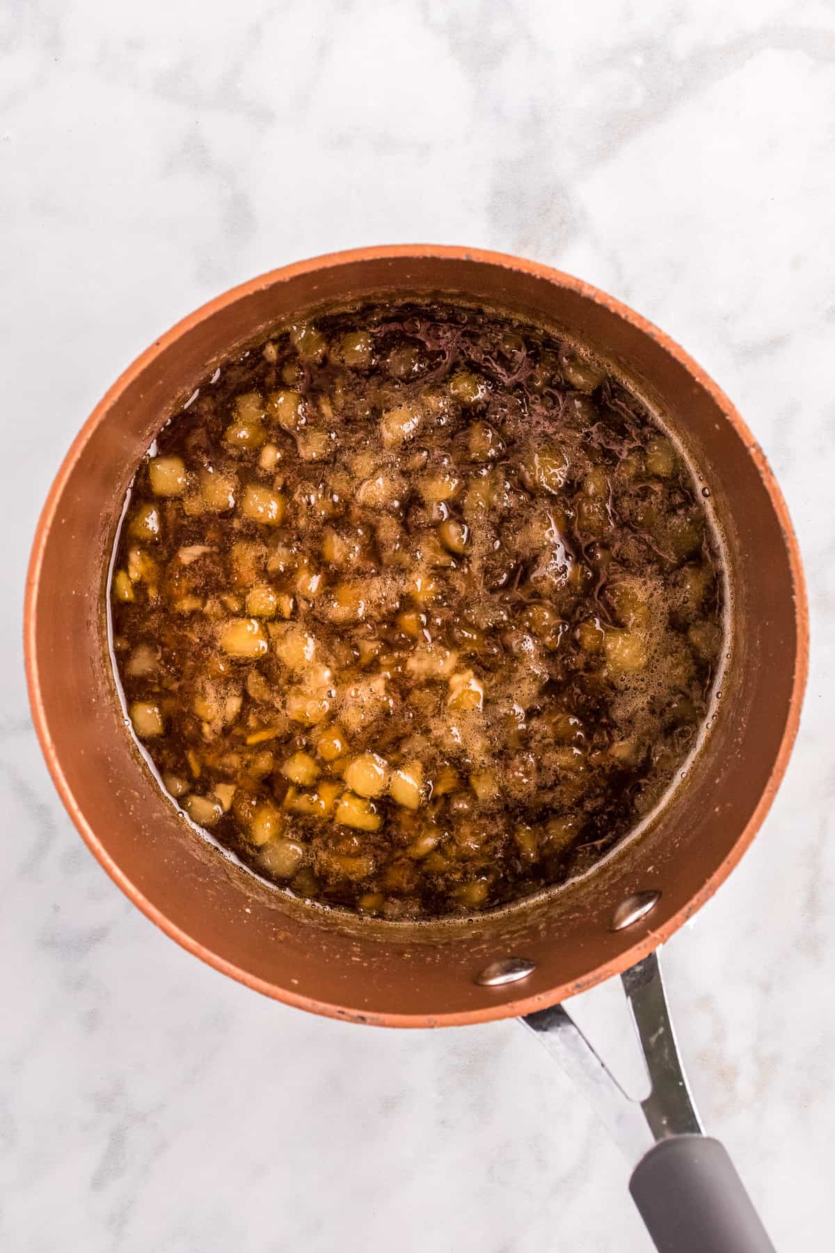 Overhead image of boiling pineapple glaze