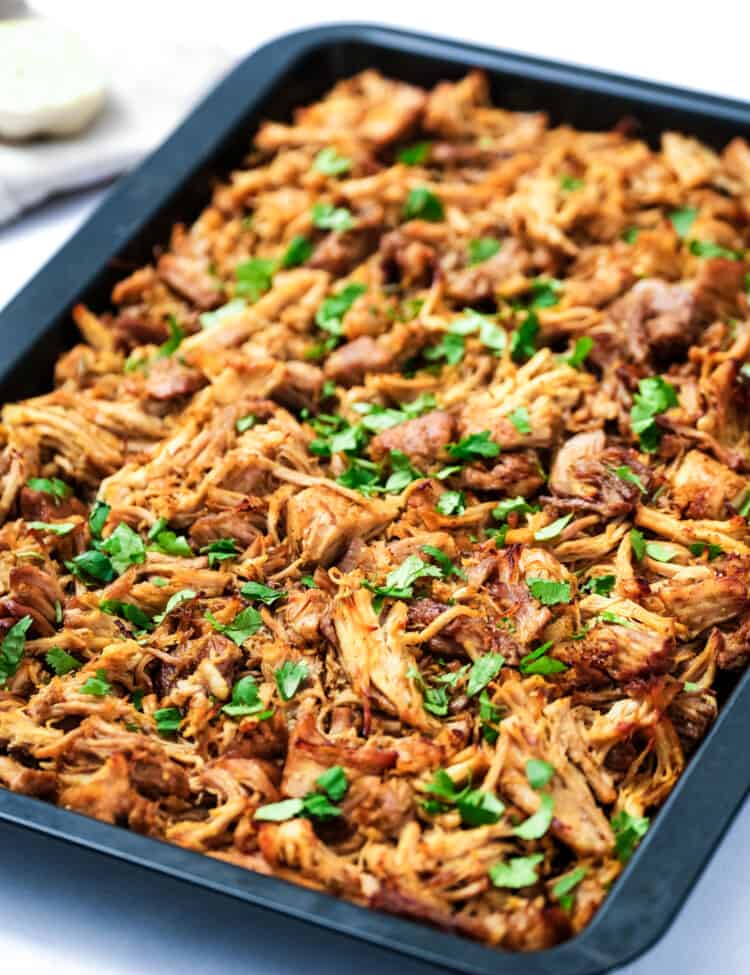 Instant Pot Carnitas broiled with chopped cilantro on top