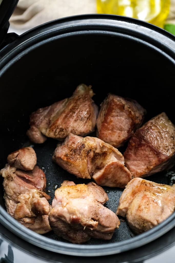 Cubed Pork shoulder being seared in Instant Pot