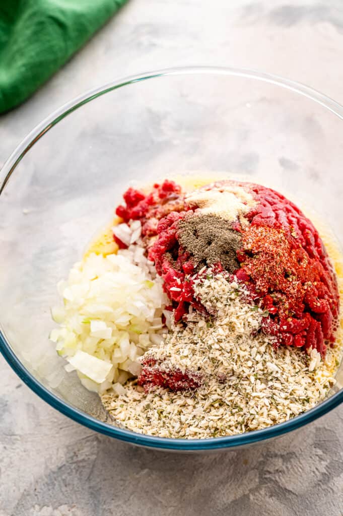 Glass bowl with meatloaf ingredients
