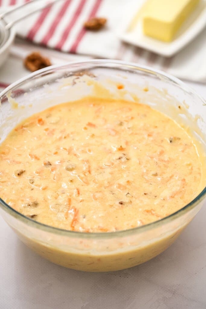 Glass bowl of carrot bar batter