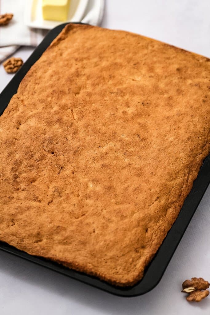 Pan with baked carrot cake bars before frosting