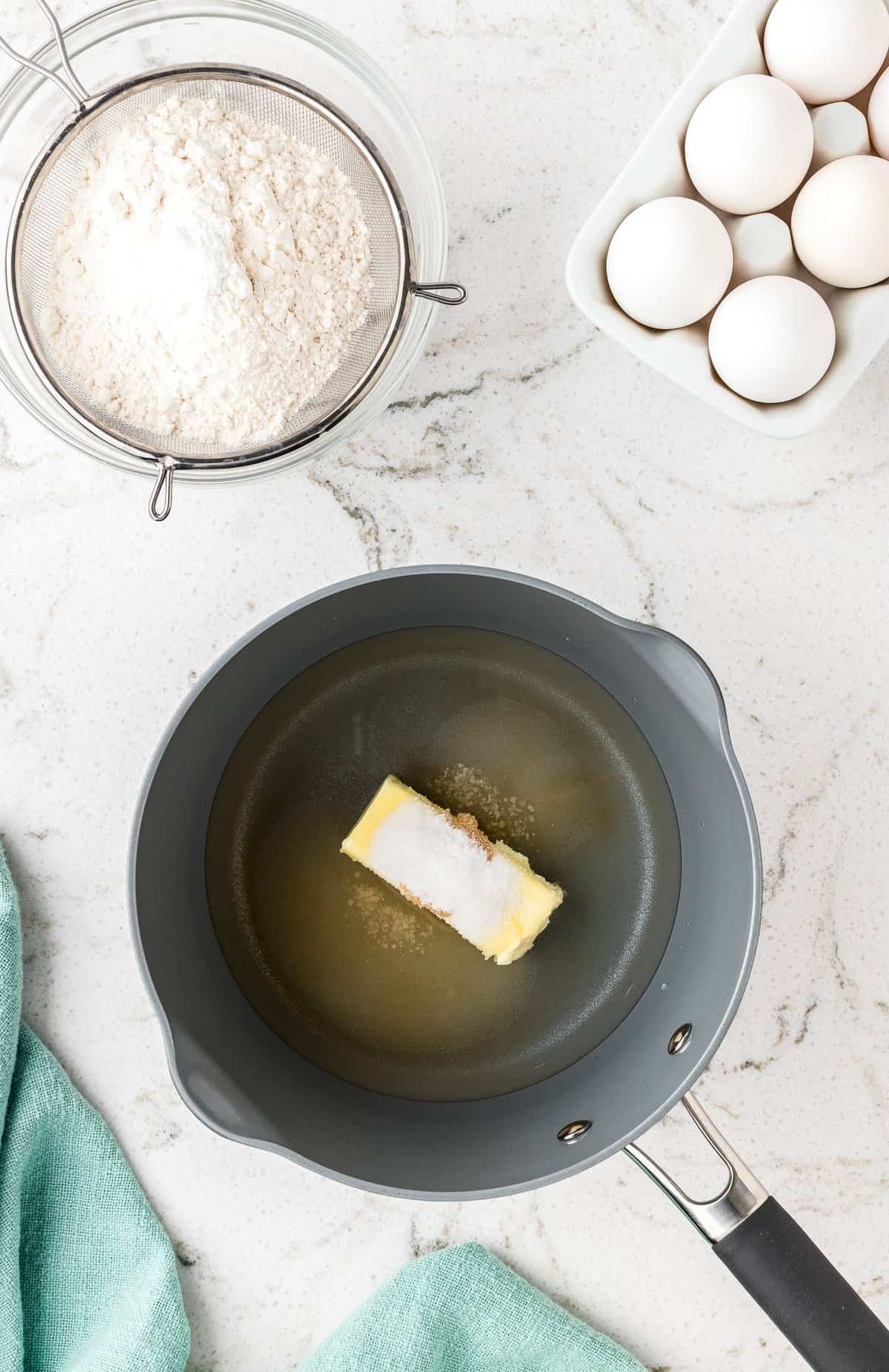 Overhead image of saucepan with melted butter