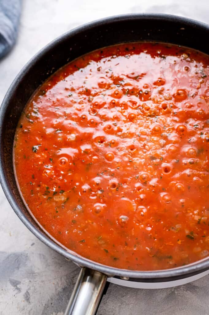 Skillet with simmering salsa
