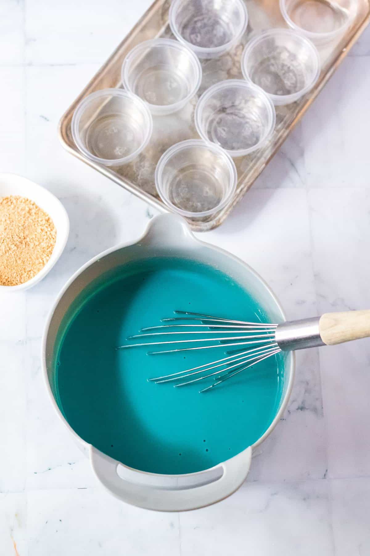 Mixing bowl with vanilla instant pudding died blue