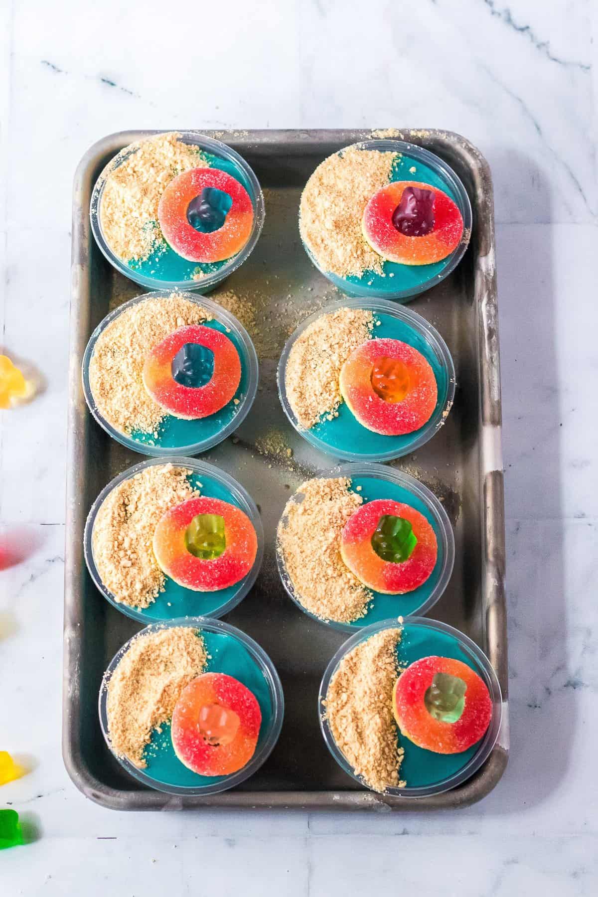 Overhead image of beach themed blue pudding shots