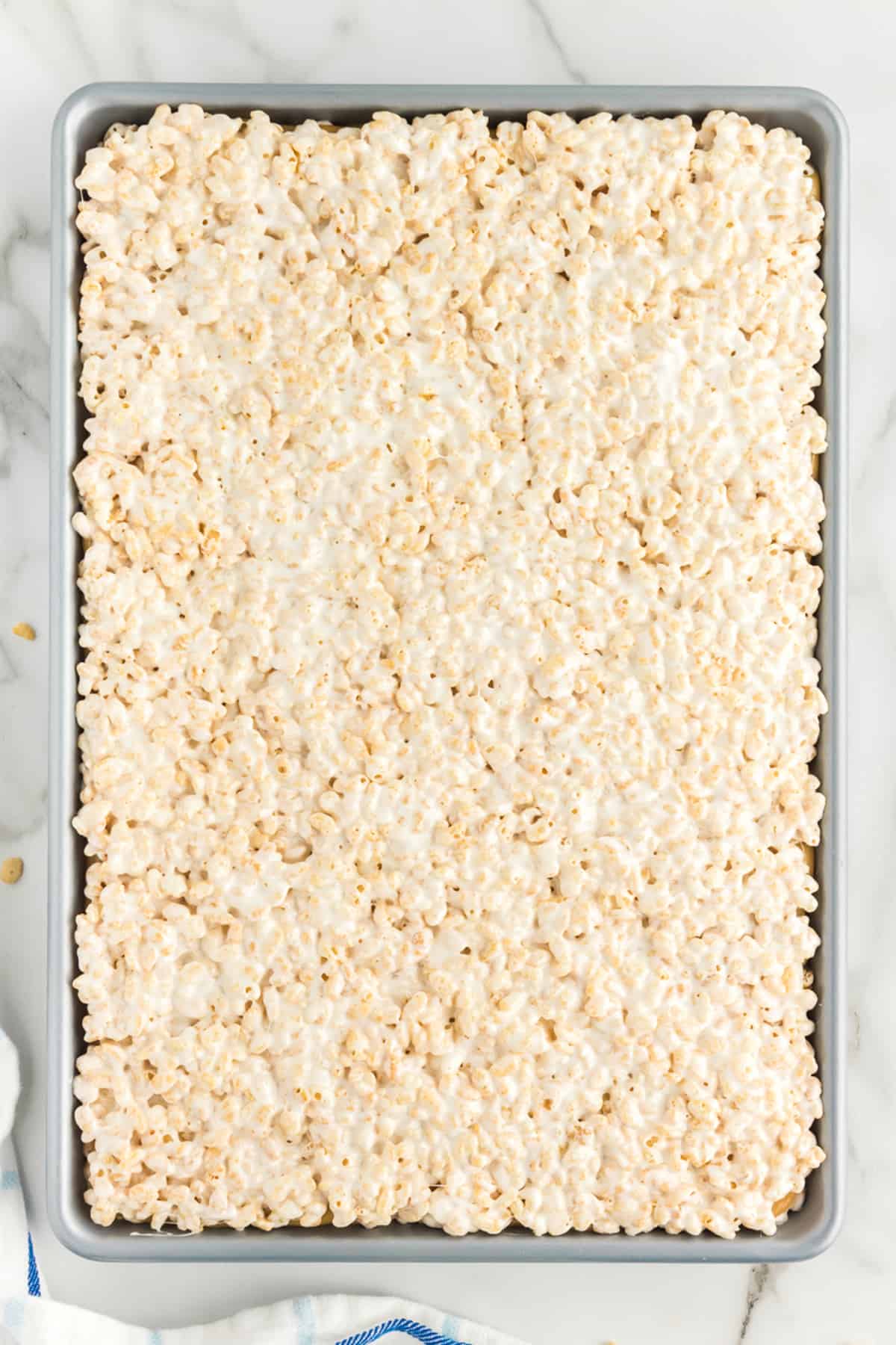 Overhead view of pan of stuffed caramel rice krispie treats